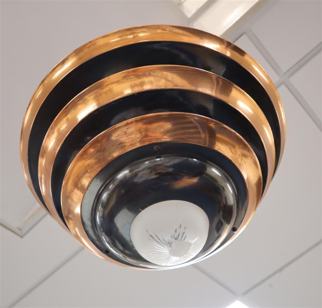An Art Deco-style copper ceiling light